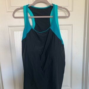 Black and turquoise swim top. Racer back